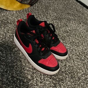 Red and black Nikes